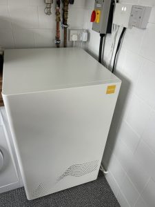 Photo (taken from above) of the ZEB heat battery boiler installed in a home.